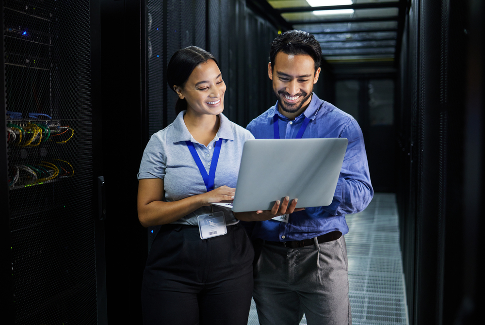 Server room, laptop and people team for software management, system upgrade and cyber security. Teamwork technician, engineering or programmer staff on computer, information technology or programming IT services in Cleveland Ohio